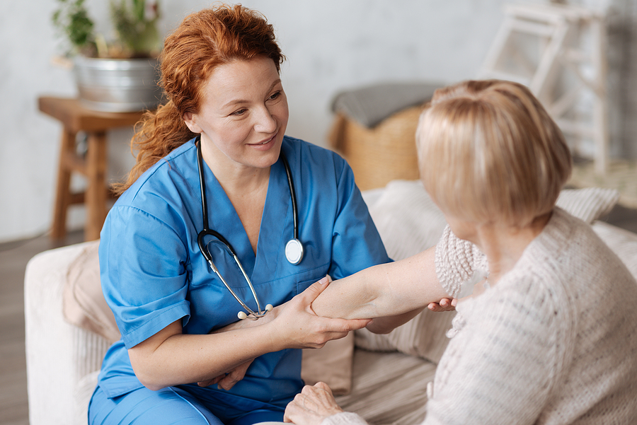 Skilled Nursing nurse interacting with resident