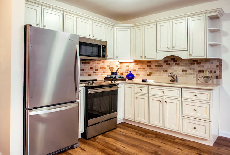 A kitchen from a one-bedroom independent living apartment available at Crestwood Manor.