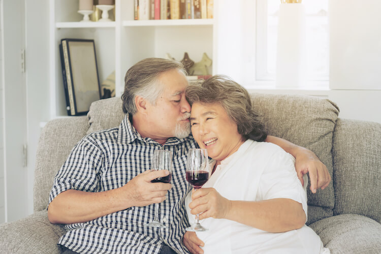 A senior couple enjoying time in their home.