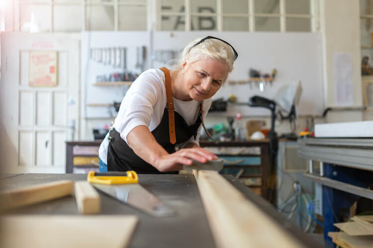 A senior woman spending time enjoying a hobby.