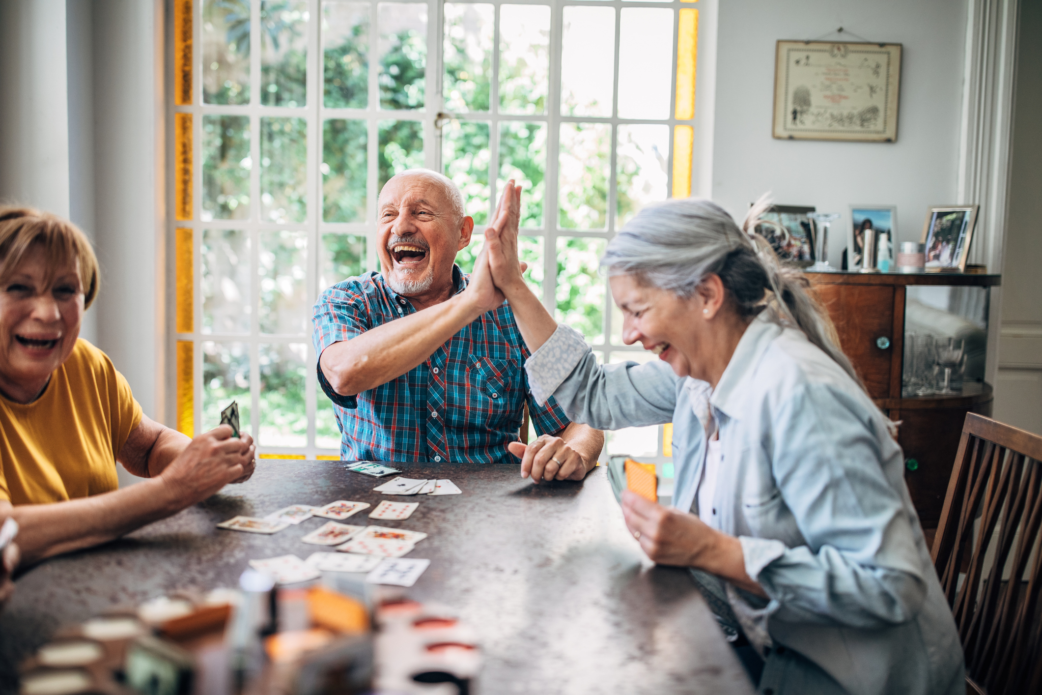 Seniors enjoying a game night